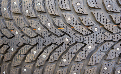 Winter tire tread texture with spikes.
