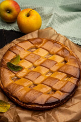Fresh baked apple cake or pie, filled with sweet apples, raisins and cinnamon