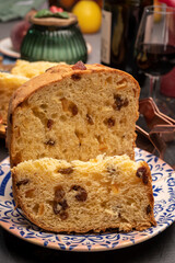 Christmas food, fresh Italian panettone cake made from yeast dough with dried fruits
