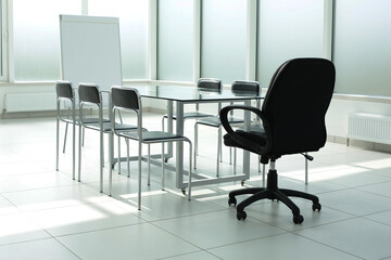 Flipchart glass table chairs in office space