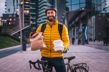 Food delivery, rider with bicycle delivering food - Powered by Adobe
