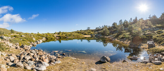 Fototapeta premium small lagoon of peñalara. Set of glacial lagoons of Peñalara, in the Sierra de Guadarrama of Madrid.
