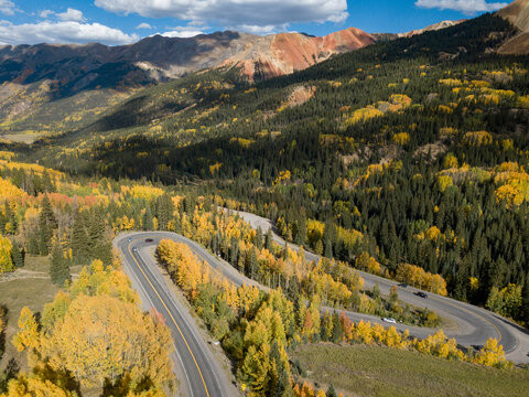 Drone shot of mountain road during autumn
