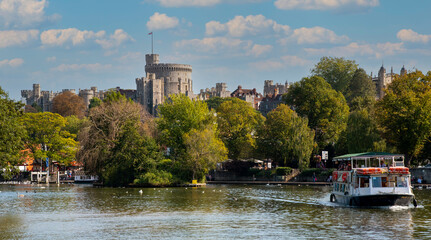 Windsor, Berkshire, England, UK. 2020. A tourist passeneger boat on the River Thames at Windsor, Berkshire, UK.