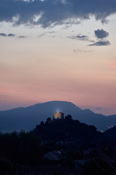 Landscape of a monastery on top of a mountain. Sunset light