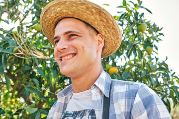 farmer smokes a cigarette sitting on the stairs taking a break