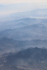 mountains in the fog