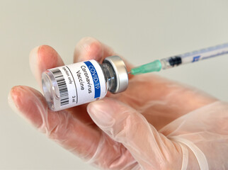 Coronavirus vaccine vial bottle in research laboratory..Close-up view