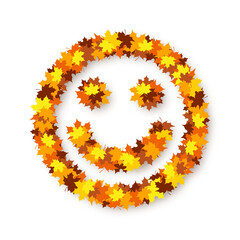 Happy smiling face is made from maple leaves over white background