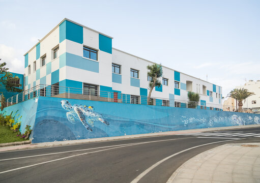 PUERTO DEL ROSARIO - FUERTEVENTURA - 12 FEBRUARY 2018. Large colorful building with painting of a big turtle