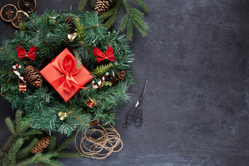 Christmas wreath on black concrete background