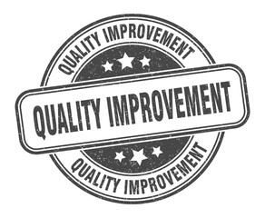 quality improvement stamp. quality improvement label. round grunge sign