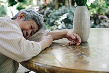 stressed depressed fatigued sad upset asian old asian elderly senior elder woman