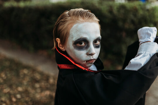 Close up of young boy dressed in Dracula costume on Halloween