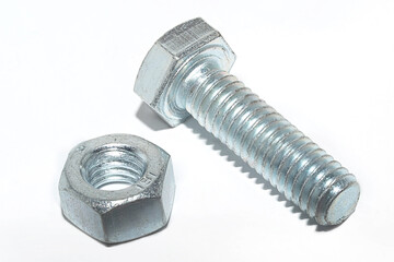 Hex bolt and nut close-up on a white background.