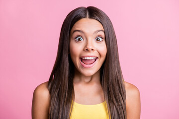 Fototapeta premium Photo portrait of excited screaming kid isolated on pastel pink colored background