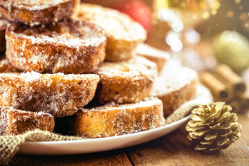 sweet christmas, typical christmas dessert from brazil. Called french toast, baked or fried bread with sugar and cinnamon.