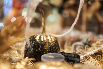 Painted pumpkin. Decorated Pumpkin in gold color. Halloween celebration concept. Pumpkin. Pumpkin decorations.