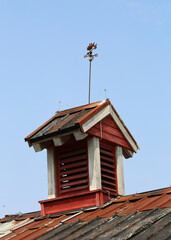 Roof with Rusty Weather Vane