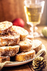 Fototapeta na wymiar sweet christmas, typical christmas dessert from brazil. Called french toast, baked or fried bread with sugar and cinnamon.