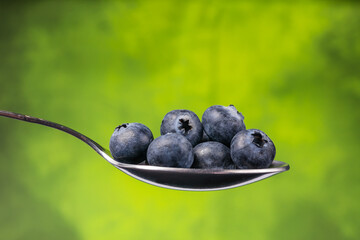 blueberries in a spoon