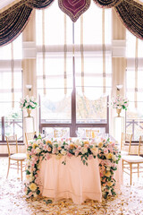luxurious wedding table with beautiful flowers. pink stylized