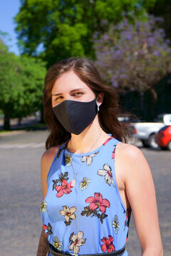Woman outdoors during covid with mask