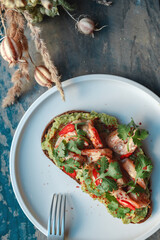 Appetizing bruschetta on a white plate. restaurant server