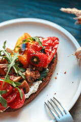 Appetizing bruschetta on a white plate. restaurant server