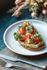 Appetizing bruschetta on a white plate. restaurant server