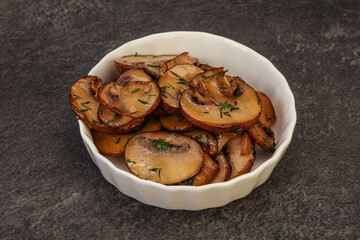 Roasted champignon with herbs and spices