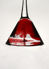 abstract red liquid in glass, magazine cover, place for text