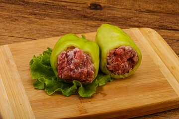 Raw stuffed pepper for cooking