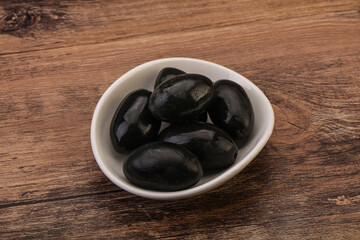 Pickled black olives in the bowl