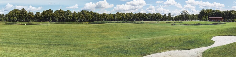 Fototapeta na wymiar Panorama of a fragment of a golf course in Mezhigirje near Kiev, Ukraine.