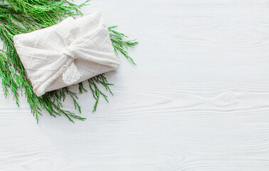 Zero waste Christmas gift boxes wrapping in traditional Japanese Furoshiki style. Hand crafted gifts with without plastic. Ecological concept, eco-friendly, eco decor new year. Сopyspace.