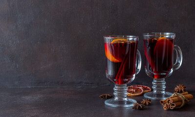Mulled wine with cinnamon and orange. Hot drink. Winter. Recipe.