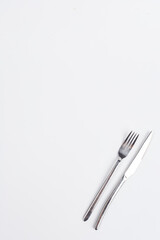 cutlery fork and knife on a white background. look from above. Space space