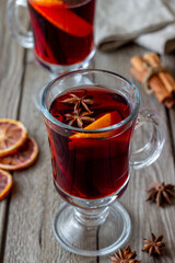 Mulled wine with cinnamon and orange. Hot drink. Winter. Recipe.