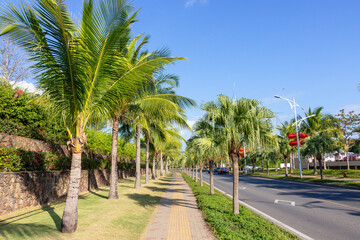 Obraz premium Bright sunny day on tropical island of Hainan in China.