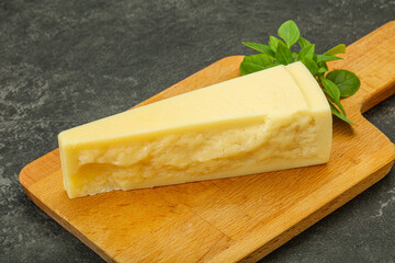 Hard parmesan cheese served basil