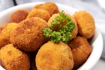 Homemade croquettes in a ceramic bowl. Typical spanish appetizer