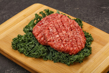 Raw beef burger cutlet for cooking