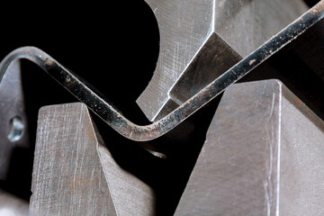 The process of bending sheet metal on a hydraulic bending machine