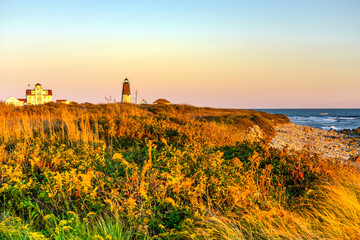 Pastel colored sky over lighthouse.