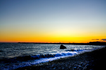 Dramaric sunset on beach.