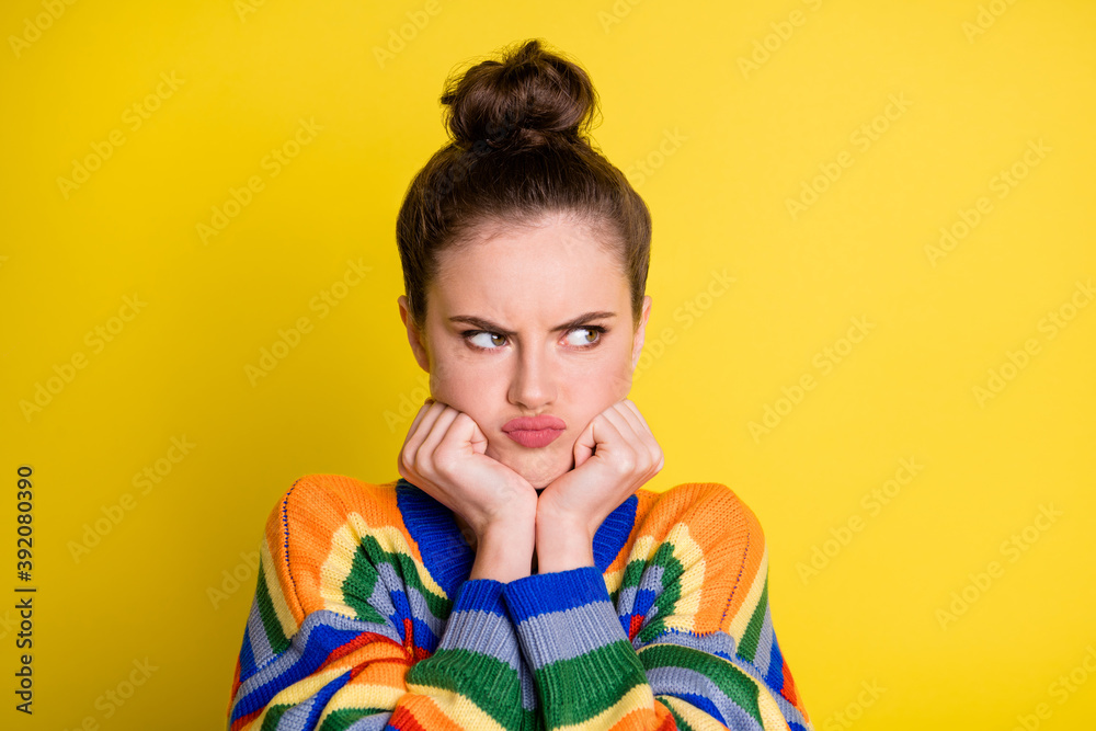 Sticker Photo of young girl unhappy sad upset displeased dissatisfied hands touch cheeks isolated over yellow color background