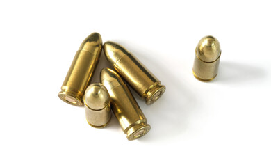 Yellow brass ammo bullets isolated on white background, view from above
