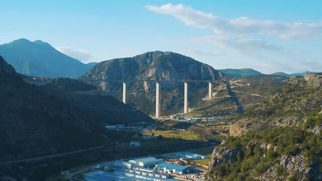 Montenegro. Aerial view of the truss bridge. Drone flying over the Mala Rijeka Viaduct on the Belgrade - Bar railway, surrounded magnificent mountains.
