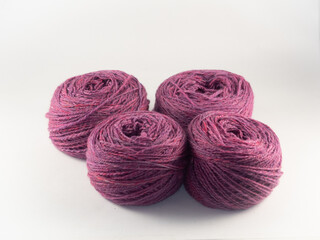 balls of handspun merino fibers isolated on a white background